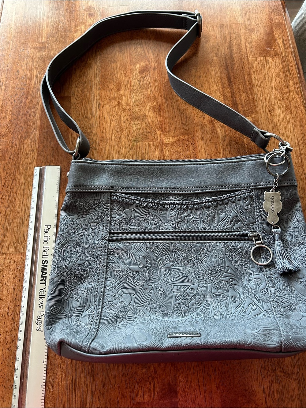 Sakroots Gray Floral Embossed Crossbody Bag with Tassel Charm